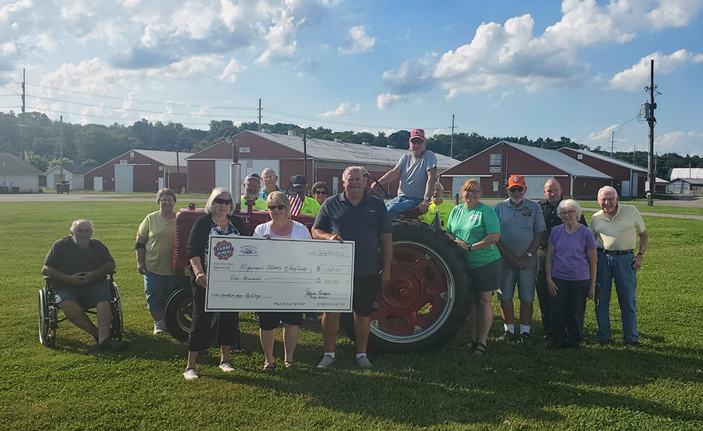 Fairfield County Antique Tractor Club with 1000 dollar donation check
